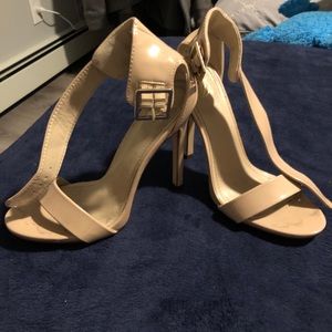 Nude high heels with strap
